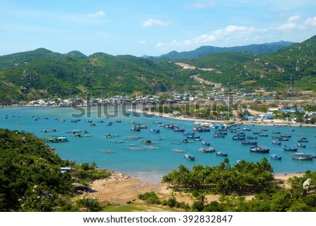 Beautiful panoramic landscape of Vietnam beach, Vinh Hy bay, Ninh Thuan, group of boat anchor at fishing village, fantastic holiday when travel at Viet Nam in summer or spring