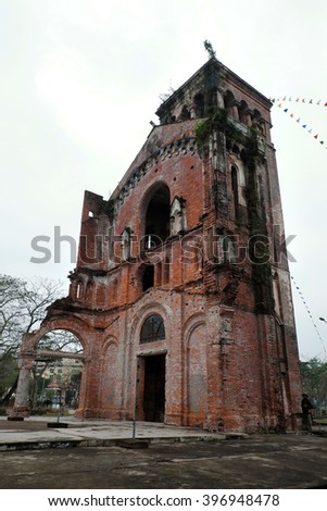 QUANG TRI, VIET NAM- FEB 20, 2016: Old church at La Vang holy land with ancient red brick wall, a place for Christian faithful to go pilgrimage, amazing old architect at Quangtri, Vietnam