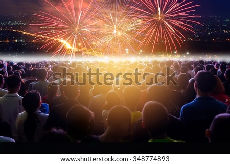 Crowd of people flow in countdown to next year with text New year