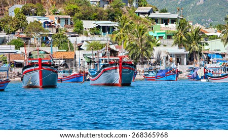 A small fishing village with a lot of fishing boats view from the sea at Nha Trang. Nha Trang is the most beautiful city with a long beach of Khanh Hoa province, Vietnam