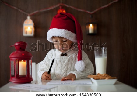 Boy, writing to Santa