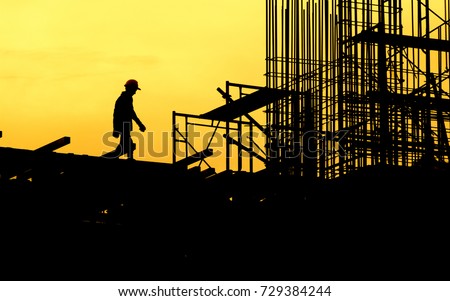 Construction worker working on a construction site,for construction teams to work in heavy industry, high ground and safety concepts.