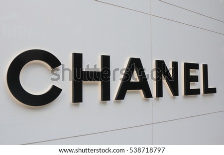 OSAKA JAPAN - OCTOBER 18, 2016: Chanel fashion brand logo. Chanel is a French privately held company that specializes in ready-to-wear clothes, luxury goods and fashion accessories