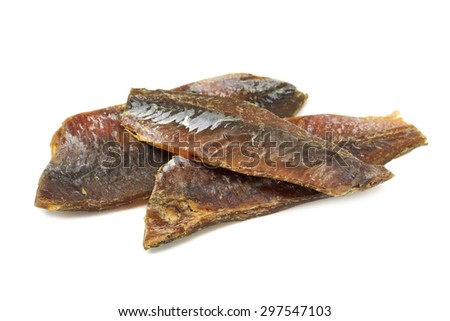 dried fish fillets on a white background