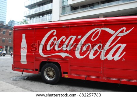 CocaCola Truck With Logos And Glass Bottle Image - Soft Drink / Pop - Vintage / Retro Red Vehicle - TORONTO, CANADA - July 2017