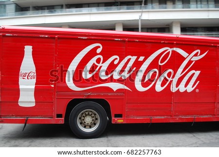 CocaCola Truck With Logos And Glass Bottle Image - Soft Drink / Pop - Vintage / Retro Red Vehicle - TORONTO, CANADA - July 2017