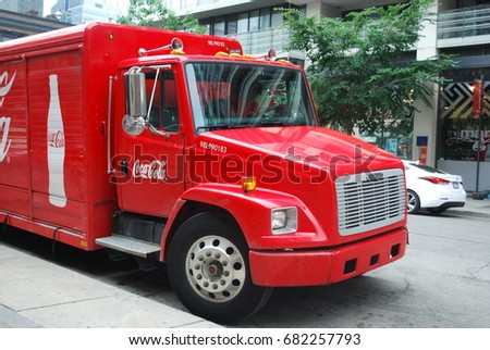 CocaCola Truck With Logos And Glass Bottle Image - Soft Drink / Pop - Vintage / Retro Red Vehicle - TORONTO, CANADA - July 2017