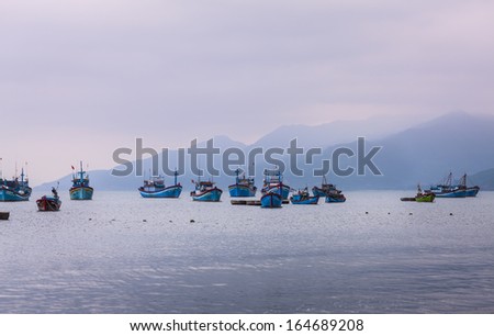 CIRCA APRIL 2010 - QUY NHON, VIETNAM - Fishing boats moored off the shore, on 24 April 2010, at Quy Nhon, Vietnam.