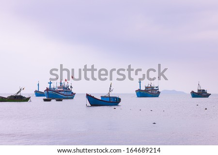 CIRCA APRIL 2010 - QUY NHON, VIETNAM - Fishing boats moored off the shore, on 24 April 2010, at Quy Nhon, Vietnam.