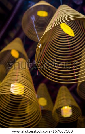 Incense coils hang in the Chinese congregation hall temple in Can Tho, Mekong Delta, Vietnam