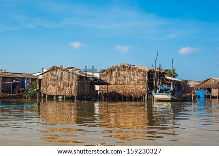 Riverside houses in Mekong delta - Vietnam