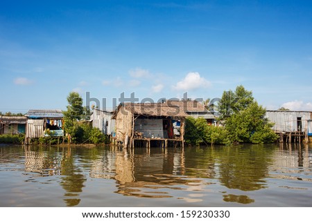 Riverside houses in Mekong delta - Vietnam