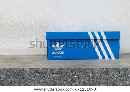 BANGKOK, THAIAND - JULY 2, 2017: Adidas Sign On Adidas Shoe Box. Founded in 1924 is a German multinational corporation that designs and manufactures sports shoes, clothing and accessories.