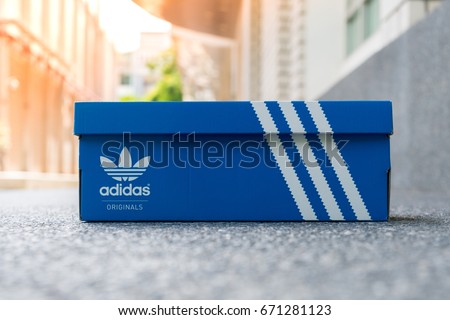 BANGKOK, THAIAND - JULY 2, 2017: Adidas Sign On Adidas Shoe Box. Founded in 1924 is a German multinational corporation that designs and manufactures sports shoes, clothing and accessories.