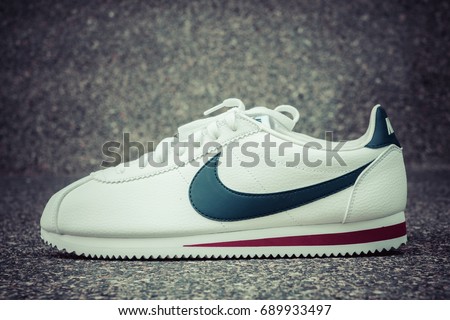 BANGKOK, THAILAND - JULY 2, 2017:Nike classic cortez white/midnight navy/gym-red ,Nike, Inc. is an American multinational corporation that designs, develops, manufactures and sells, process color.
