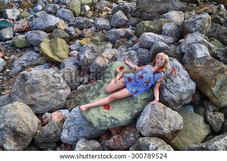 corpse girl young dead rocks person woman body shutterstock