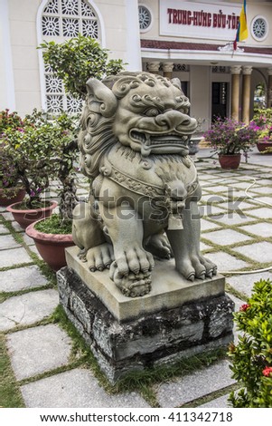 DA NANG, VIETNAM - FEBRUARY 23, 2016: A lion at the Cao Dai temple of Da Nang, Vietnam. The Cao Dai religion is the third largest religion in Vietnam.