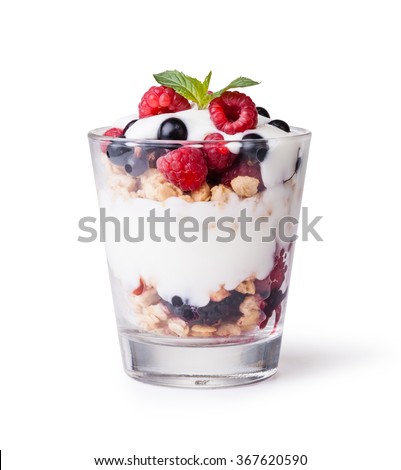 yogurt with muesli and berries on white background