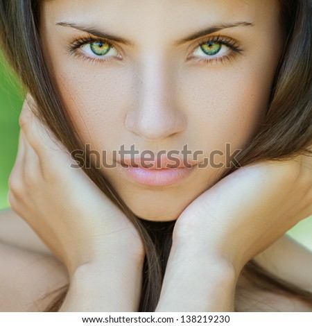 https://thumb1.shutterstock.com/display_pic_with_logo/186589/138219230/stock-photo-portrait-of-beautiful-young-woman-against-background-of-summer-green-park-138219230.jpg