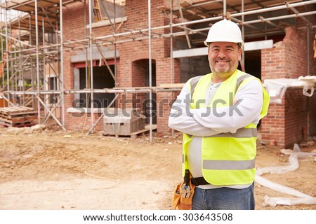 Portrait Of Construction Worker On Building Site