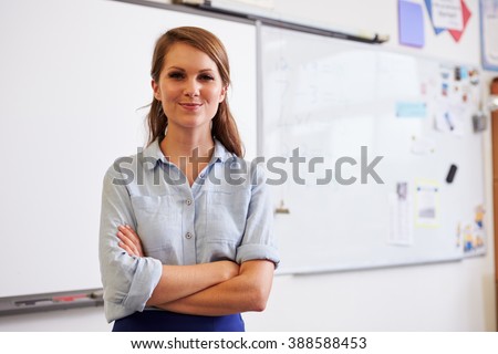 Portrait of confident young Caucasian female teacher
