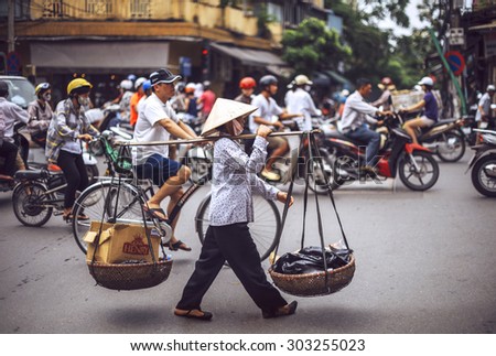 Hanoi, Vietnam - May 2, 2015: Vietnamese street market lady seller, on May 2, 2015, in Hanoi, Vietnam