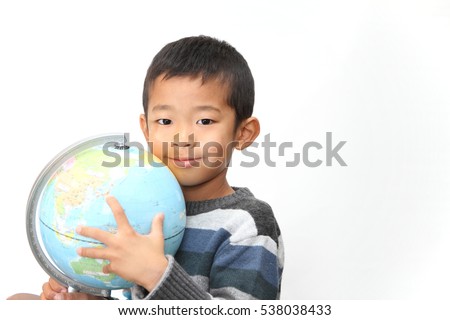 Globe and Japanese boy (first grade at elementary school)