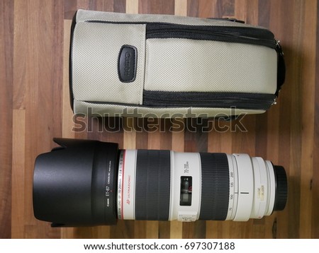 BOSTON, USA - AUGUST 16: One of the most used lens in the world, the Canon EF 70-200mm F/2.8 USM IS L II in a close-up shot showcasing its sturdy construction on August 16, 2017.