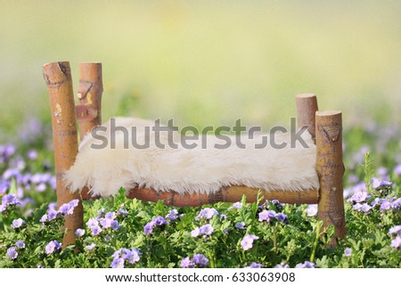 Newborn faux bed prop for studio photography.