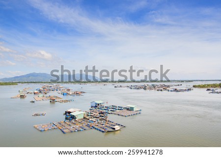 Float fishing village, Long Son, Long Hai, Ba Ria- Vung Tau Vietnam. People living and doing feed fish industry at floating village.