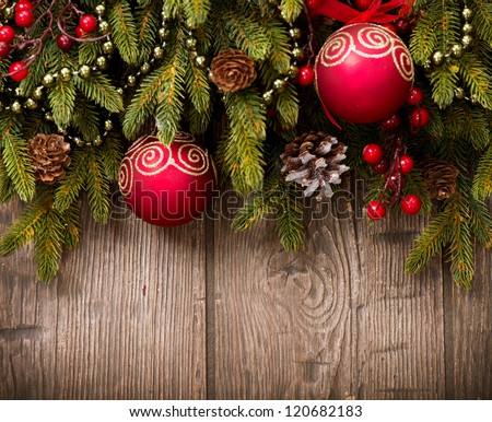 Christmas Decoration Over Wooden Background. Decorations over Wood. Vintage
