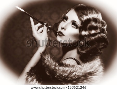 https://thumb1.shutterstock.com/display_pic_with_logo/195826/153521246/stock-photo-retro-woman-portrait-beautiful-woman-with-mouthpiece-cigarette-smoking-lady-vintage-styled-153521246.jpg