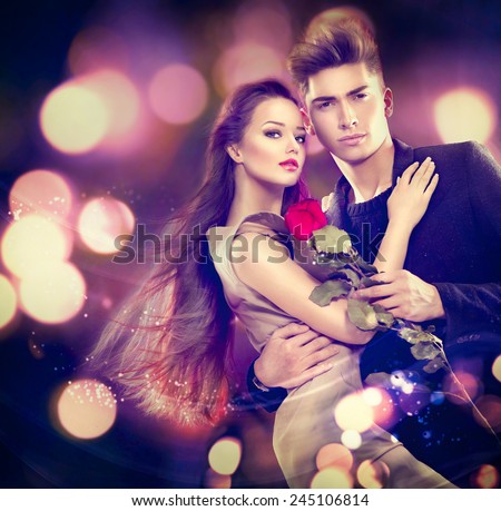 https://thumb1.shutterstock.com/display_pic_with_logo/195826/245106814/stock-photo-valentine-couple-in-love-beauty-fashion-model-girl-with-handsome-model-guy-dancing-together-245106814.jpg