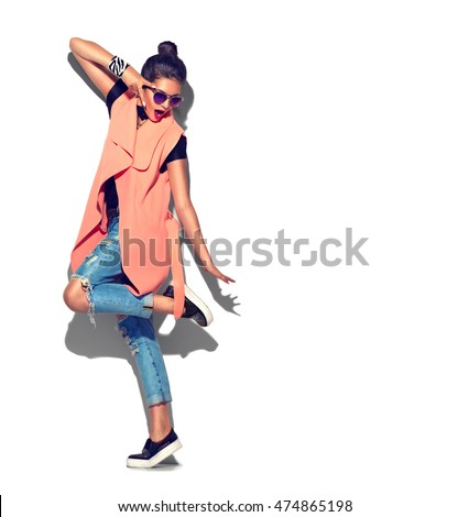 Fashion Model girl full length portrait isolated on white background. Beauty stylish brunette woman posing in fashionable clothes in studio. Casual style, beauty accessories. High fashion urban style