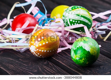 kettle concept one pink candle Colorful baubles on background with green wooden in Christmas