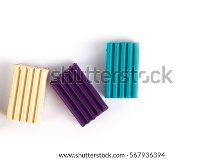 Photo children's colored plasticine isolated on white background. Materials for creativity.