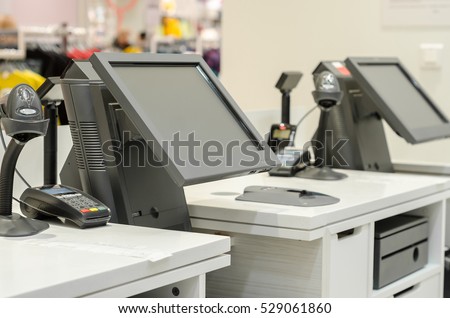 monitors the cash register in a shop selling