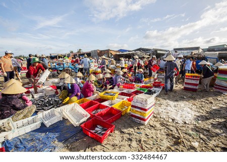 VUNG TAU, VIETNAM - AUG 23,2015: Fishermen on beach at the Fishing Village Long Hai, Vietnam.