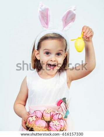 Portrait Of An Excited Easter Kid Holding Egg Decoration