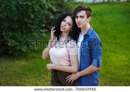 https://thumb1.shutterstock.com/display_pic_with_logo/2017265/706850968/stock-photo-teens-on-a-date-in-a-city-park-they-hug-each-other-couple-in-love-romantic-date-706850968.jpg