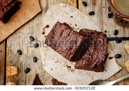 black bean brownies on a dark wood background. the toning. selective focus