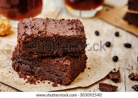 black bean brownies on a dark wood background. the toning. selective focus