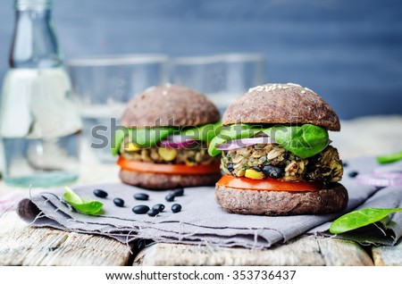 quinoa black bean spinach corn burgers with black beans bun crust. toning. selective Focus
