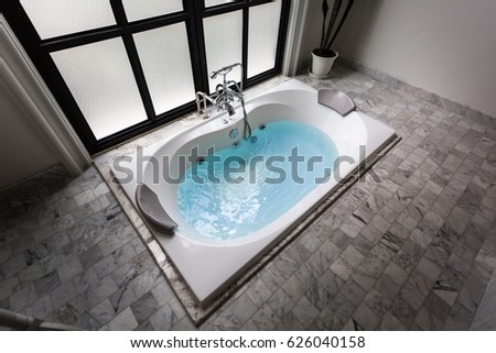 Jacuzzi Stock Images, Royalty-Free Images & Vectors | Shutterstock  jacuzzi bath tub on marble floor with water