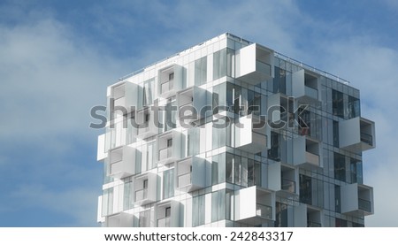 Modern Apartment Building Stock Images, Royalty-Free Images ...  White abstract background of a modern apartment building with balconies