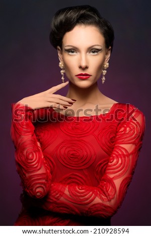 http://thumb1.shutterstock.com/display_pic_with_logo/208768/210928594/stock-photo-beautiful-elegant-woman-wearing-red-dress-and-lovely-makeup-210928594.jpg
