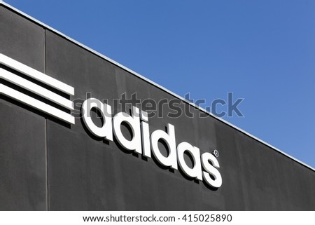 Skejby, Denmark - May 1, 2016: Adidas logo on a wall. Adidas is a German multinational that manufactures sports shoes, clothing. It is the second biggest sportswear manufacturer in the world