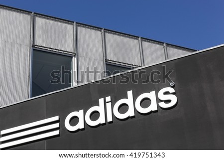 Skejby, Denmark - May 1, 2016: Adidas logo on a wall. Adidas is a German multinational that manufactures sports shoes, clothing. It is the second biggest sportswear manufacturer in the world