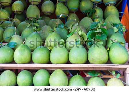 Pomelo, tropical fruit displayed at Vinh Long fruit market, Mekong delta. The majority of Vietnam's fruits come from the many orchards of the Mekong Delta