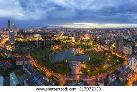 Hanoi skyline cityscape at twilight period. Cau Giay park, west of Hanoi